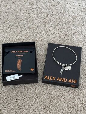 Alex and Ani Silver Feather Charm Bangle with Logo Discs